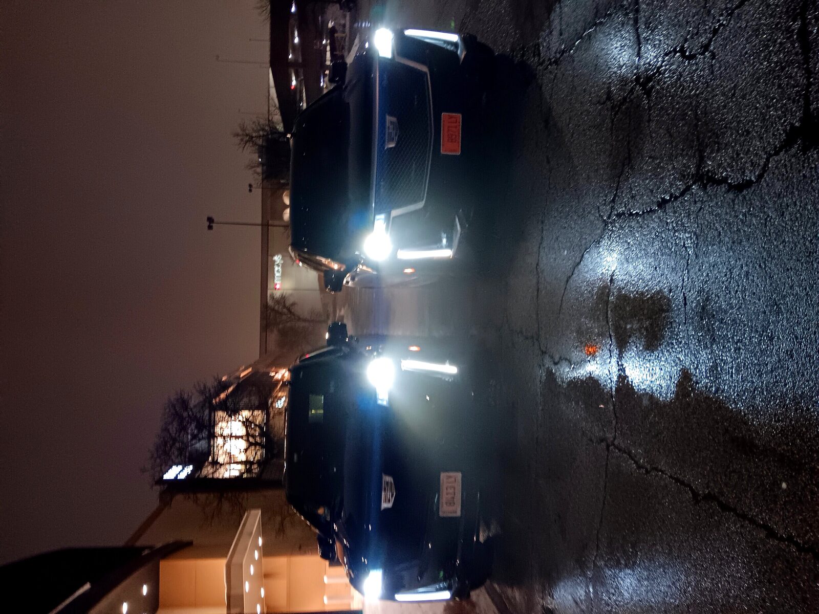 Cadillac Escalade ESV at hotel entrance — premium airport transfer