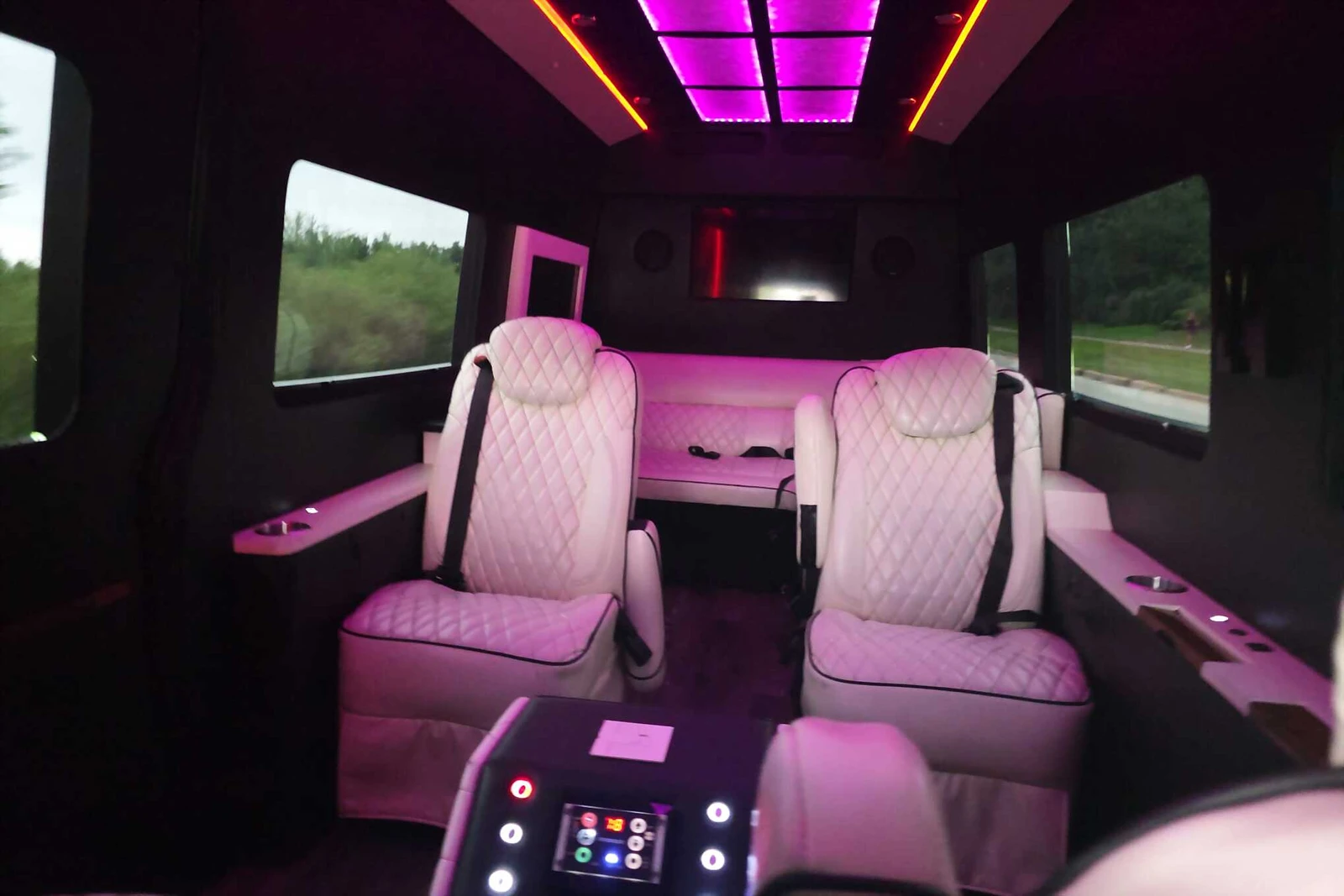 Jet Sprinter Limo interior with jet-style captain's seats and LED lighting - Royal Carriage Limousine Chicago
