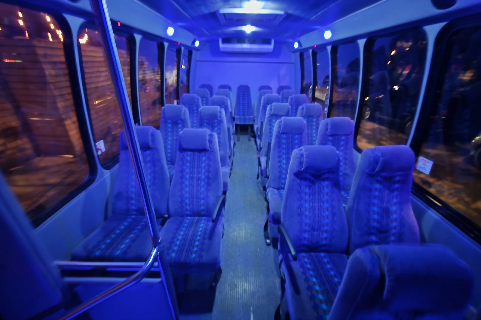 Mini bus interior with rows of seats