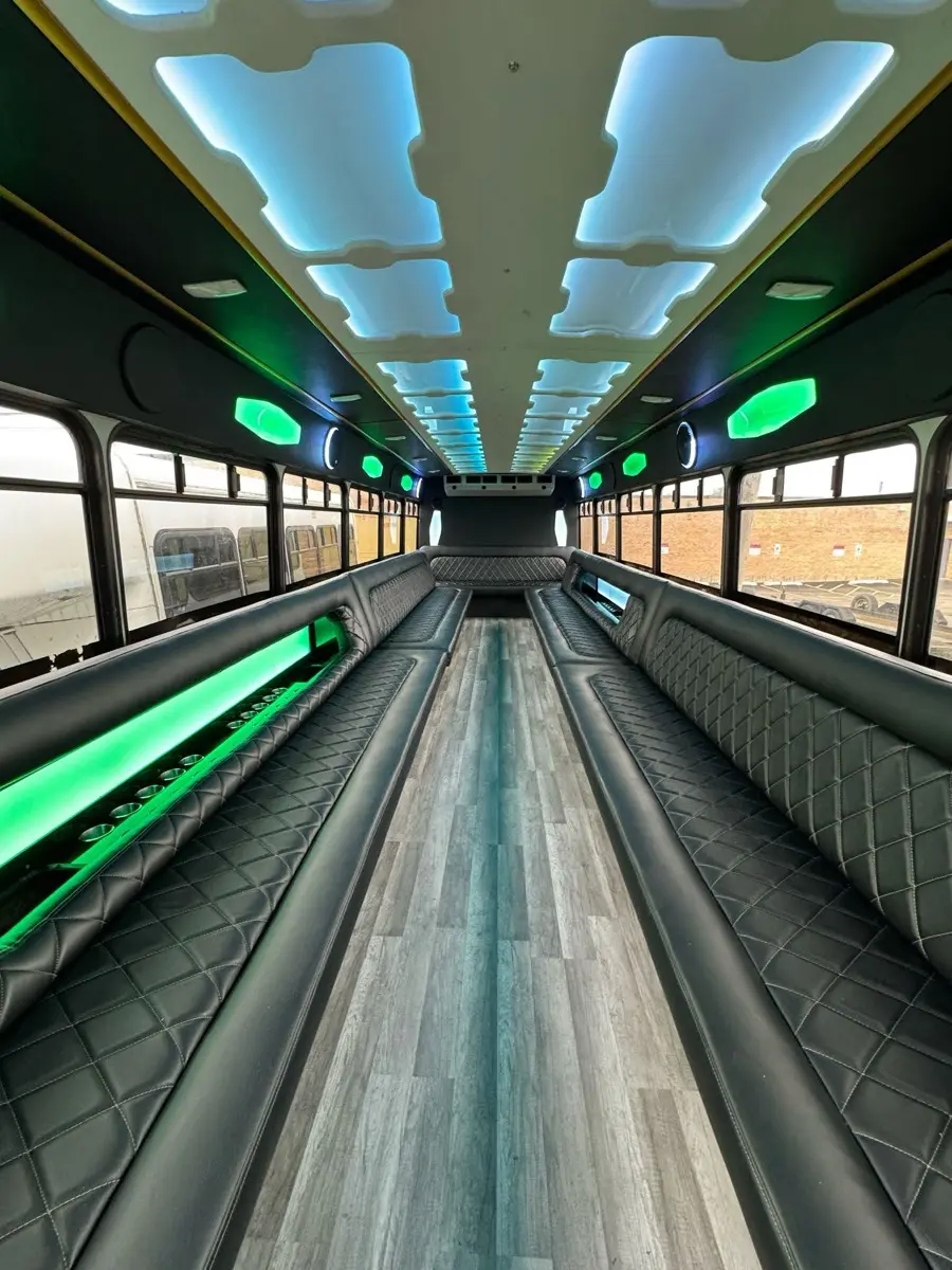 40-Passenger Party Bus interior with LED ceiling and quilted leather bench seating - Royal Carriage Limousine Chicago
