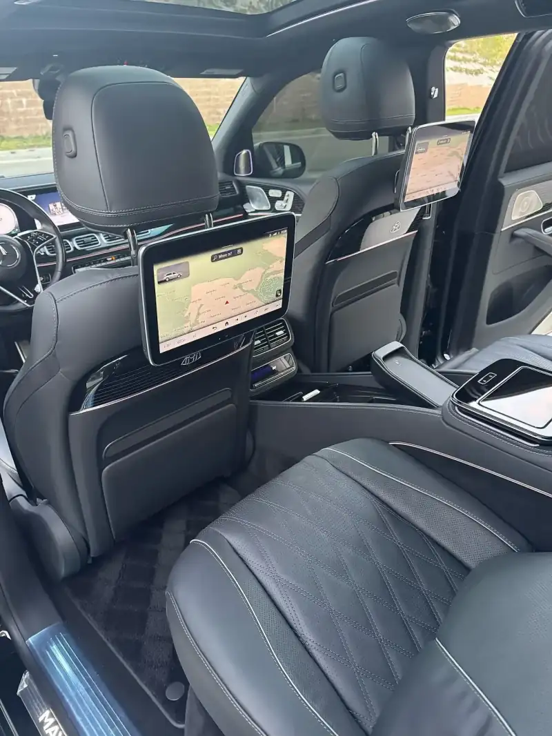 Cadillac Escalade interior — premium leather and ambient lighting