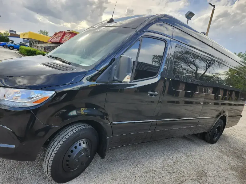 Sprinter limo van exterior parked downtown Chicago