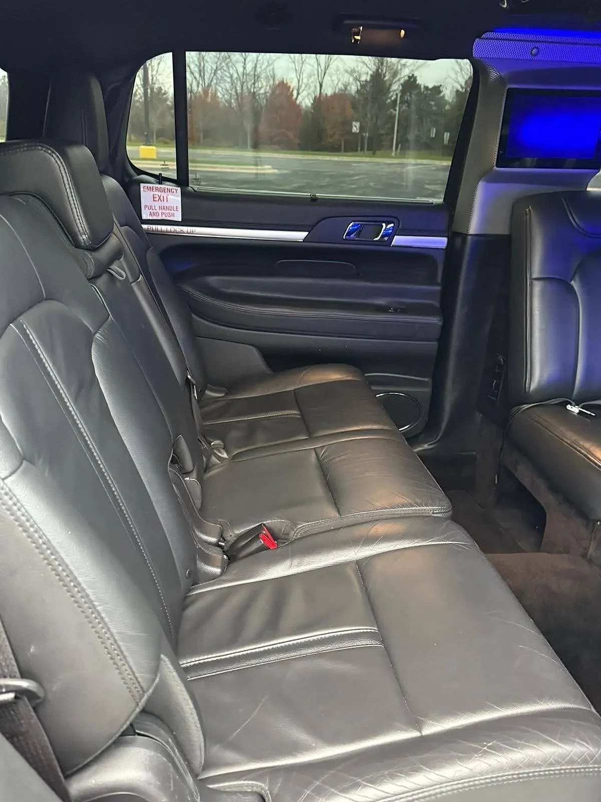 White stretch limousine exterior — bridal transportation Chicago